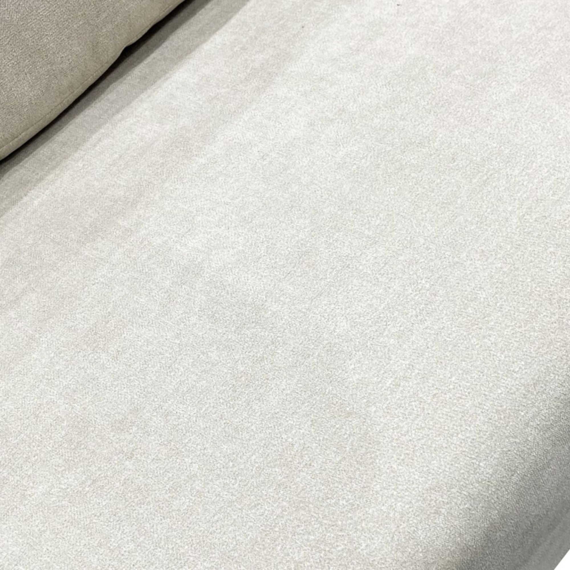 Beige Ellison Seater sofa by Brassex with plush cushions and fabric upholstery, shown from a front angle in a modern living room setting.