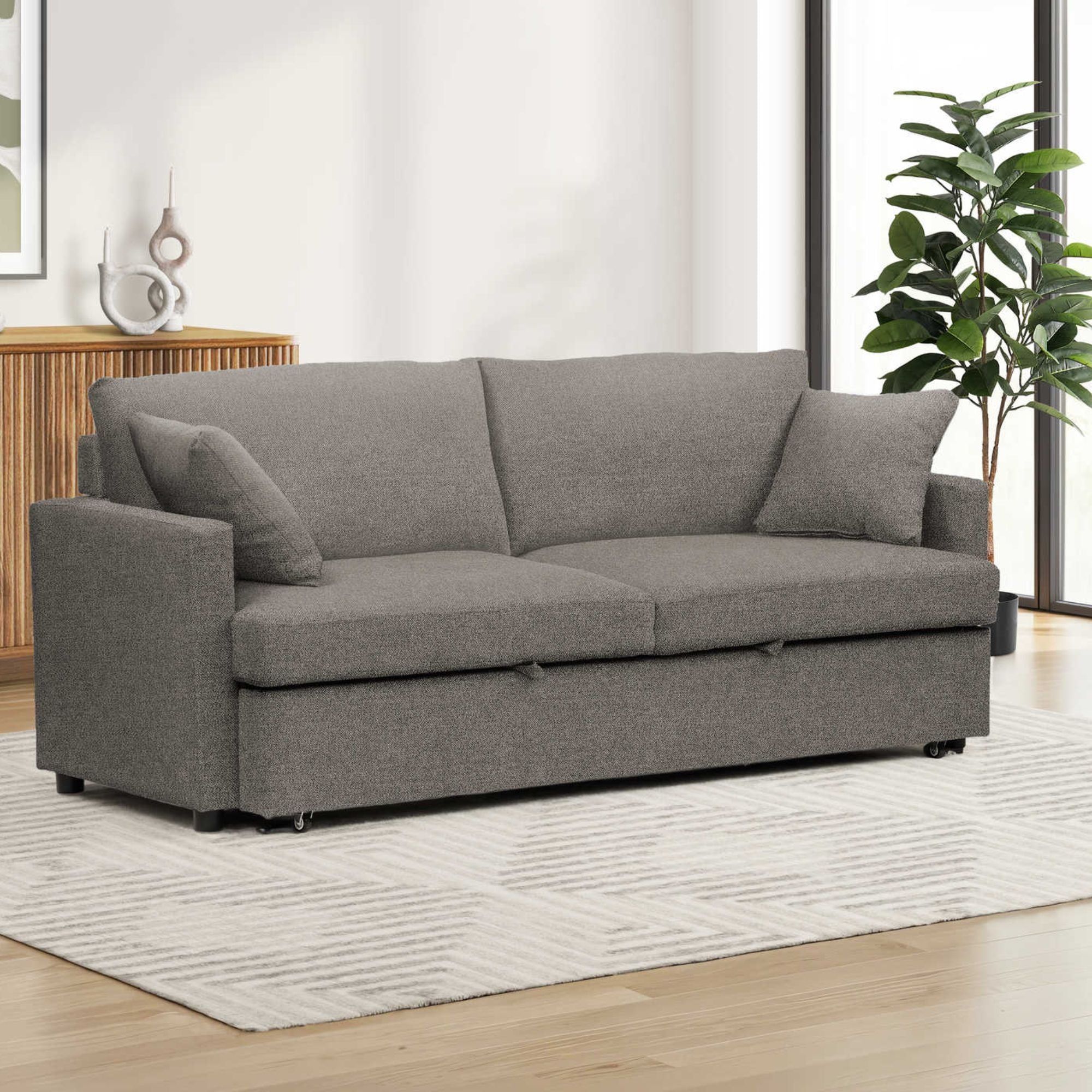 Brown Monarch Specialties sofa bed convertible sleeper with cushions and armrests, shown in a pulled-out sleeping position.