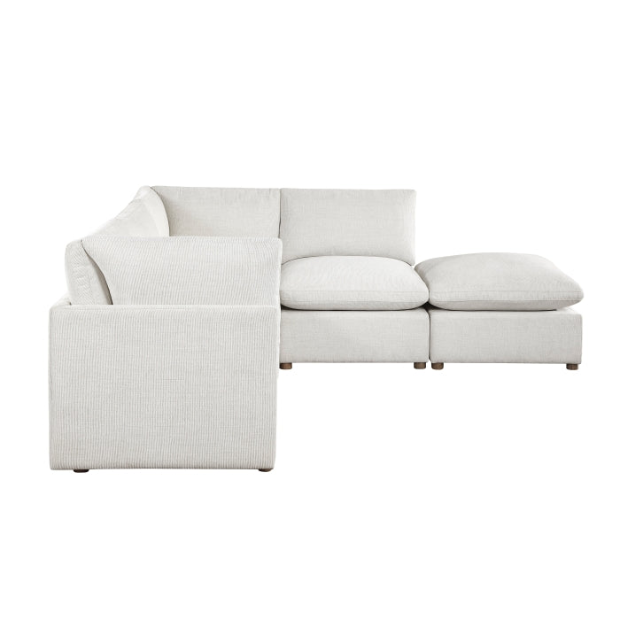 MAZ Haven 5-piece modular sectional sofa with matching ottoman, beige fabric, and plush cushions, shown from side view.