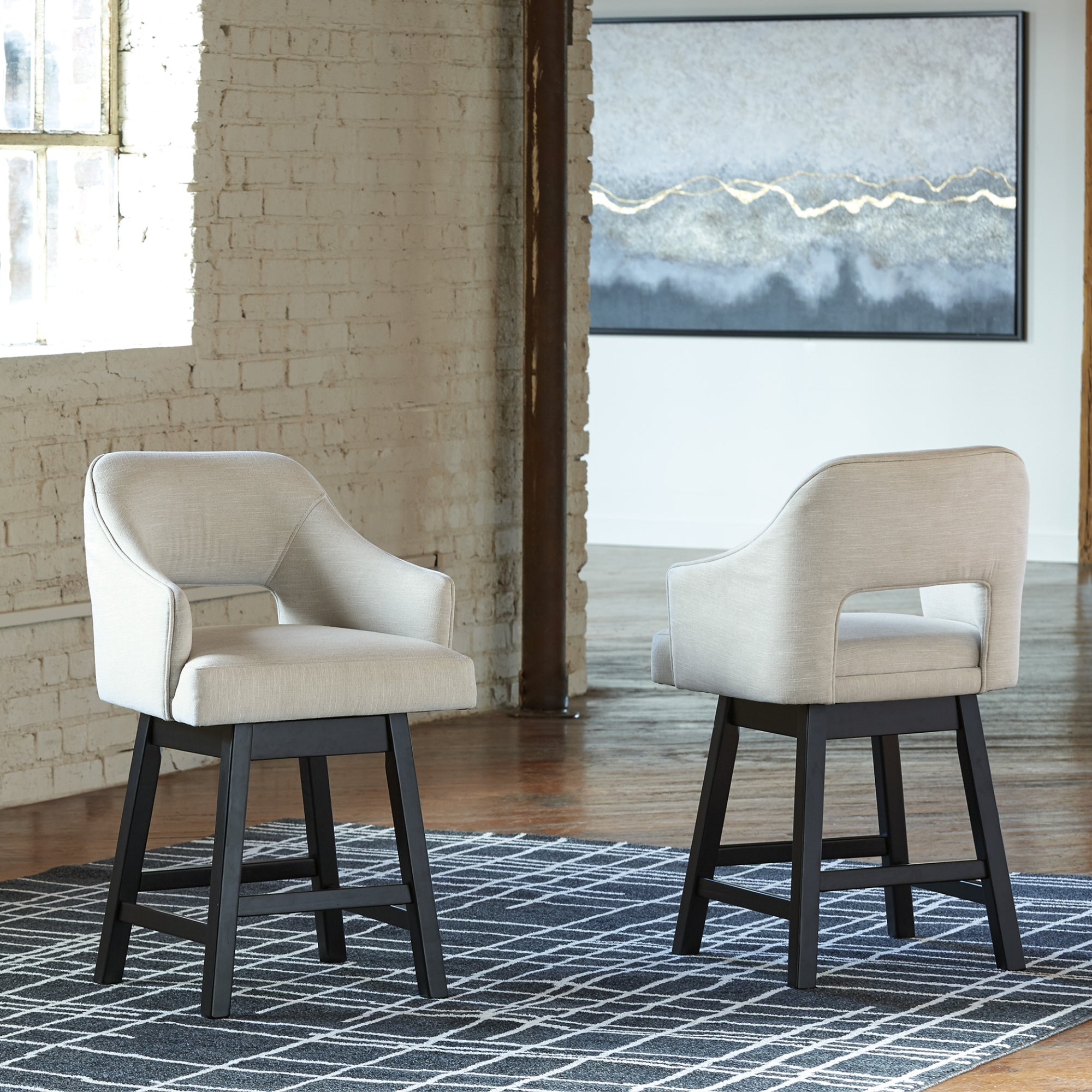 Set of two Tallenger UPH swivel barstools with linen upholstery and dark brown finish by Signature Ashley, showing modern seating design.