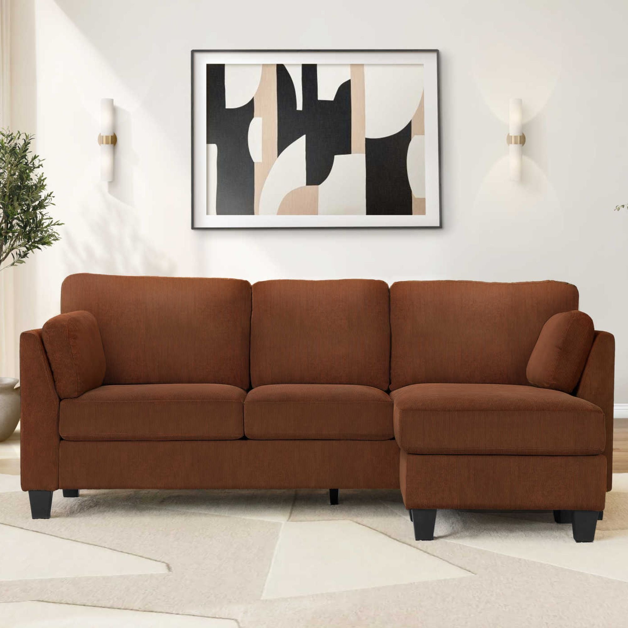Reversible Monarch Specialties Harper sectional sofa in rust fabric with chaise and modern design, shown in a living room setting.