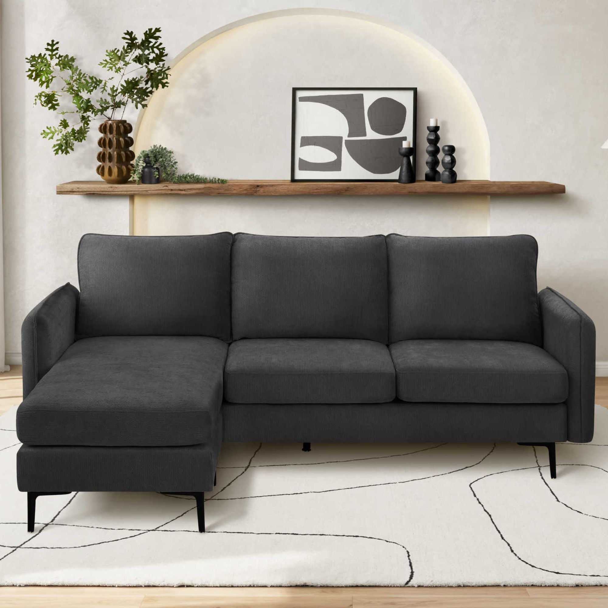 Black Everett 85-inch reversible sectional sofa by Monarch Specialties, featuring modern design and plush seating.
