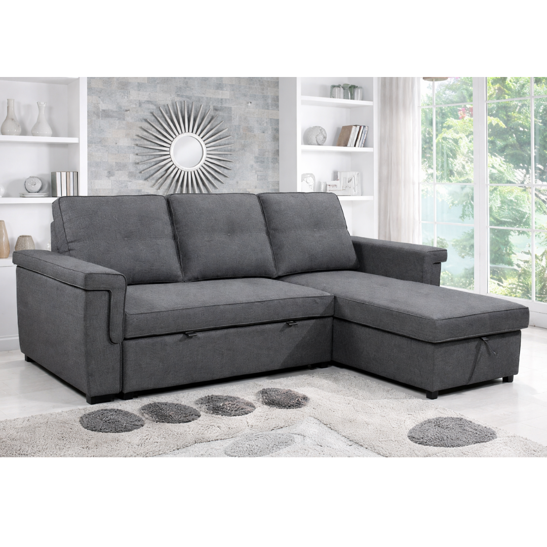 Grey IFF reversible sectional sleeper with storage chaise, showcasing the sofa's convertible design and plush fabric.