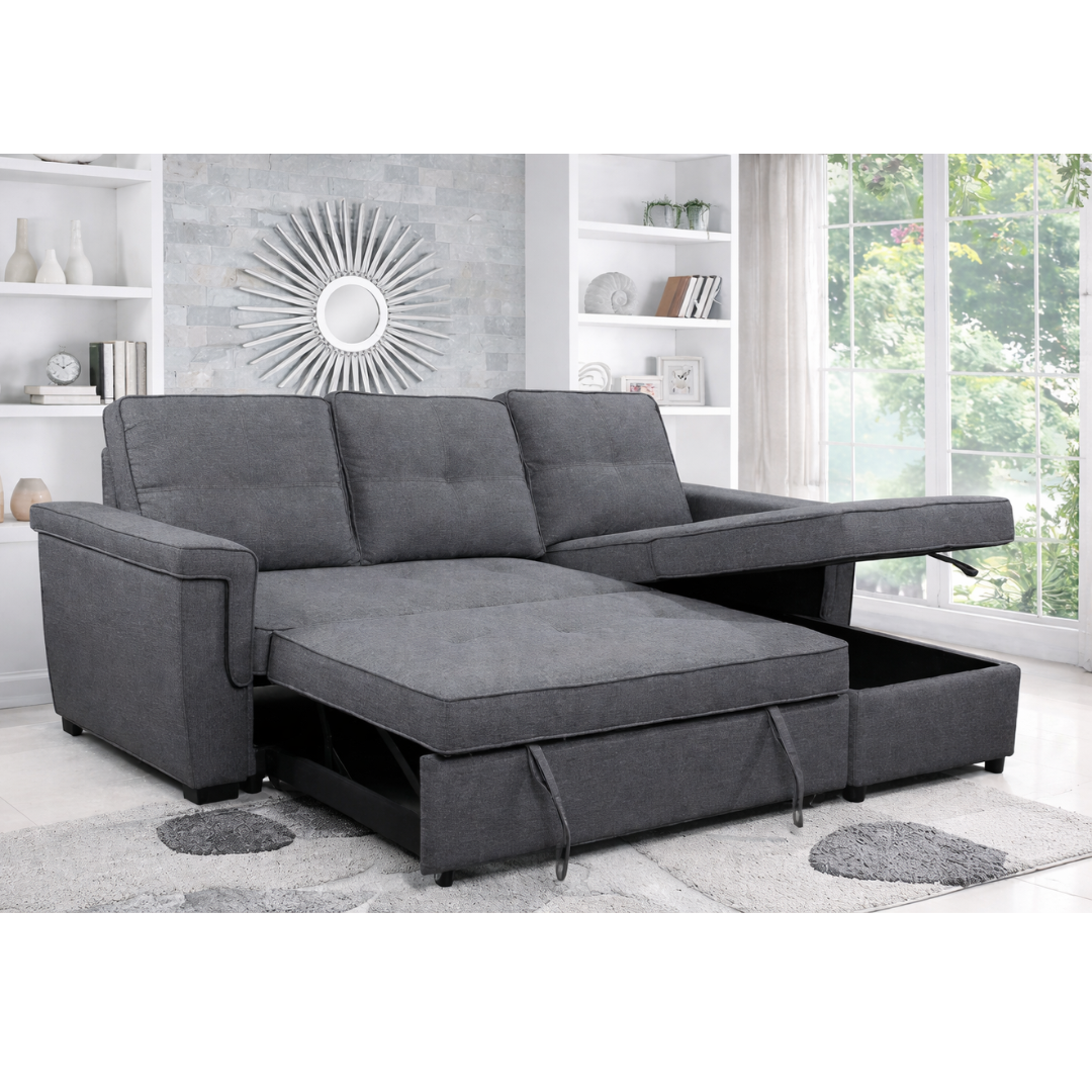 Grey IFF reversible sectional sleeper with built-in storage chaise, featuring comfortable seating and a fold-out bed.