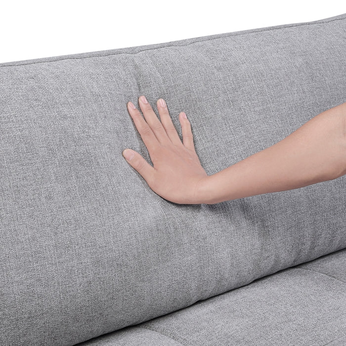 Close-up of MAZ Tidal 3-piece modular sofa in grey fabric showing detailed stitching and cushion texture.