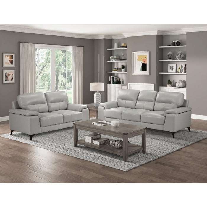 Light grey Mischa leather loveseat by Mazin Furniture with plush cushions and sleek design, perfect for modern living rooms.