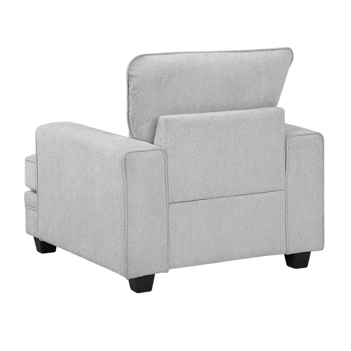 MAZ Sarah accent chair with beige upholstery and wooden legs, shown from the back, stylish and comfortable for living room decor.