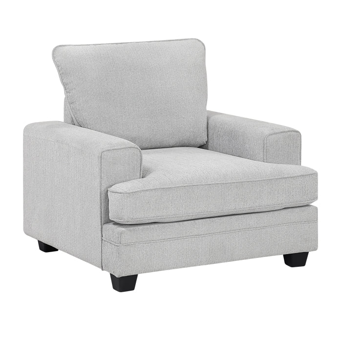 MAZ Sarah accent chair with beige upholstery and wooden legs, viewed from the side, showcasing modern design and comfortable seating.