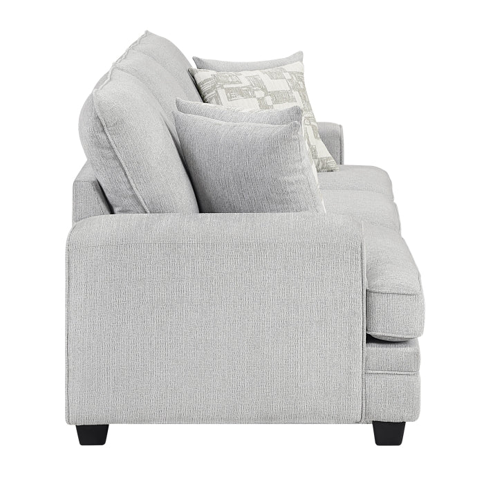 Side view of the MAZ Sarah 3-Seat Sofa with plush fabric upholstery and modern design, shown without background.