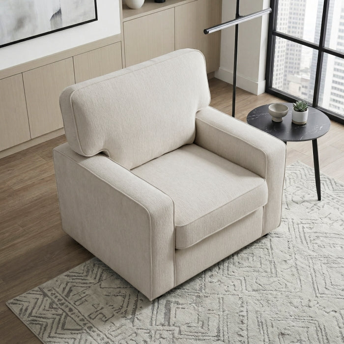 Cream MAZ Frances Collection accent chair with wooden legs, shown from a side view in a stylish living space.
