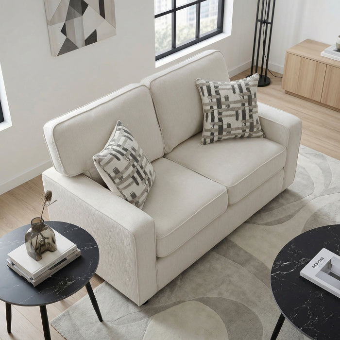 Cream-colored MAZ Frances Collection loveseat showing side view with plush upholstery and modern design.