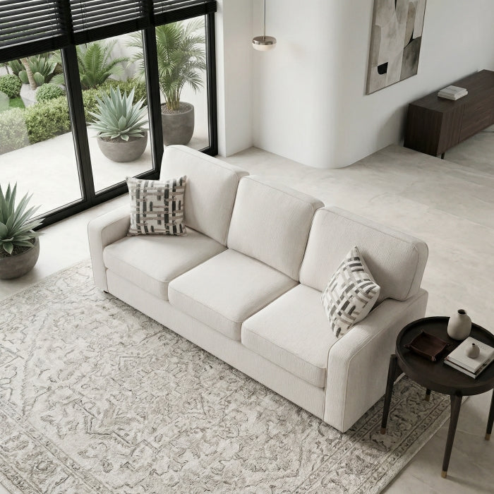 Cream MAZ Frances Collection 3-seat sofa seen from the side, showcasing plush upholstery and contemporary design.