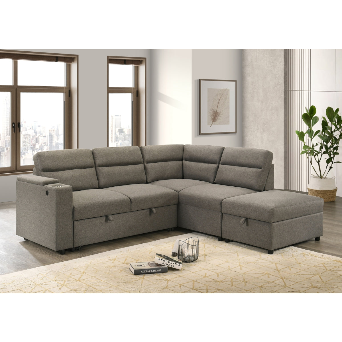 Maz Marasi 3-piece sectional sleeper with storage ottoman, featuring chaise and storage arms, shown in a closed position from an angle.