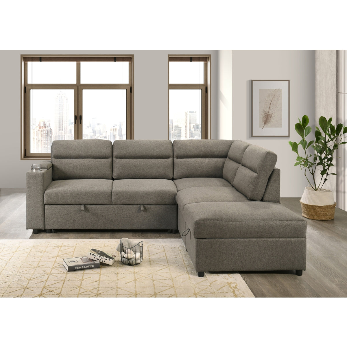 Maz Marasi 3-piece sectional sleeper with storage ottoman, featuring a chaise and storage arms, shown in a closed position from the front.