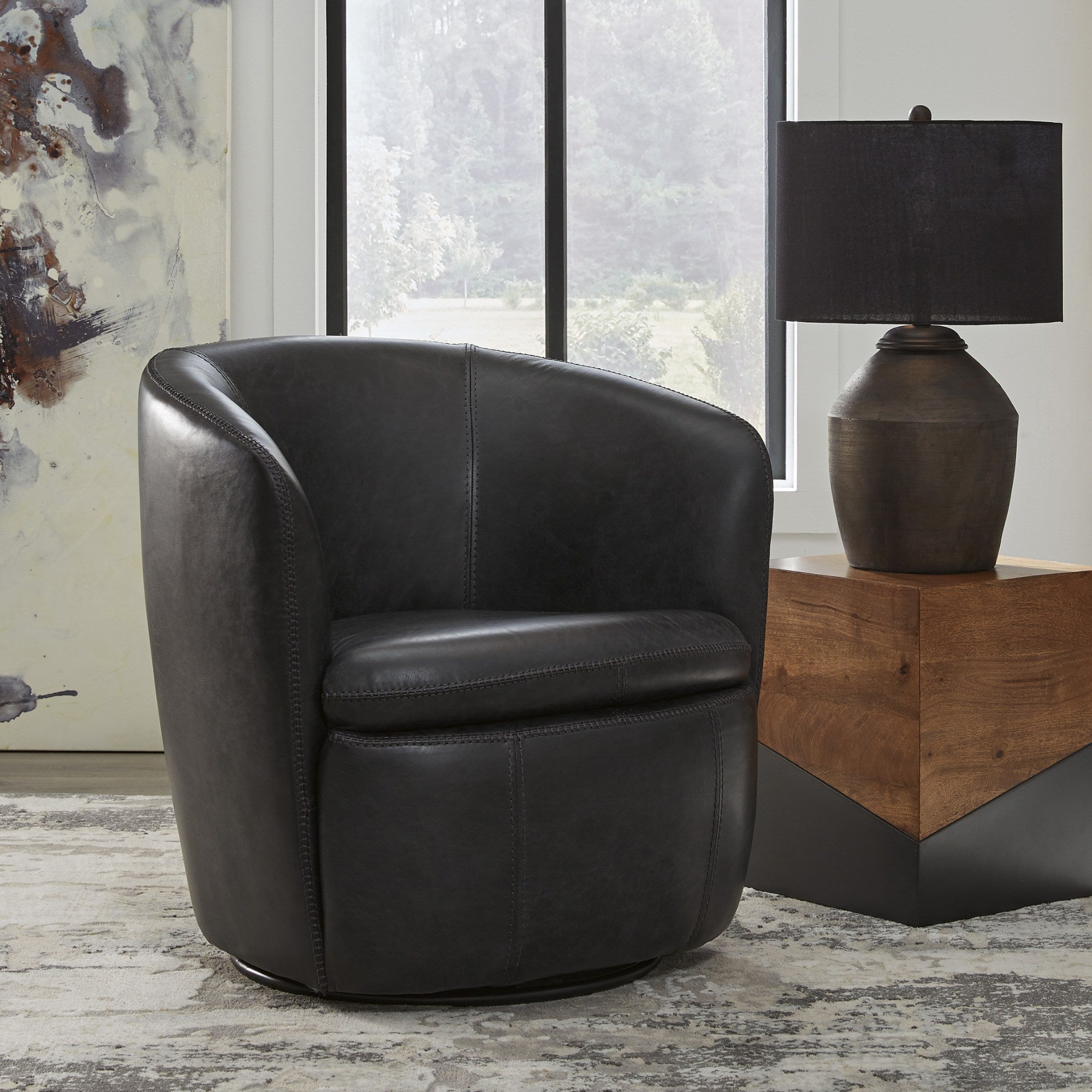Kierreys Leather Swivel Accent Chair Midnight