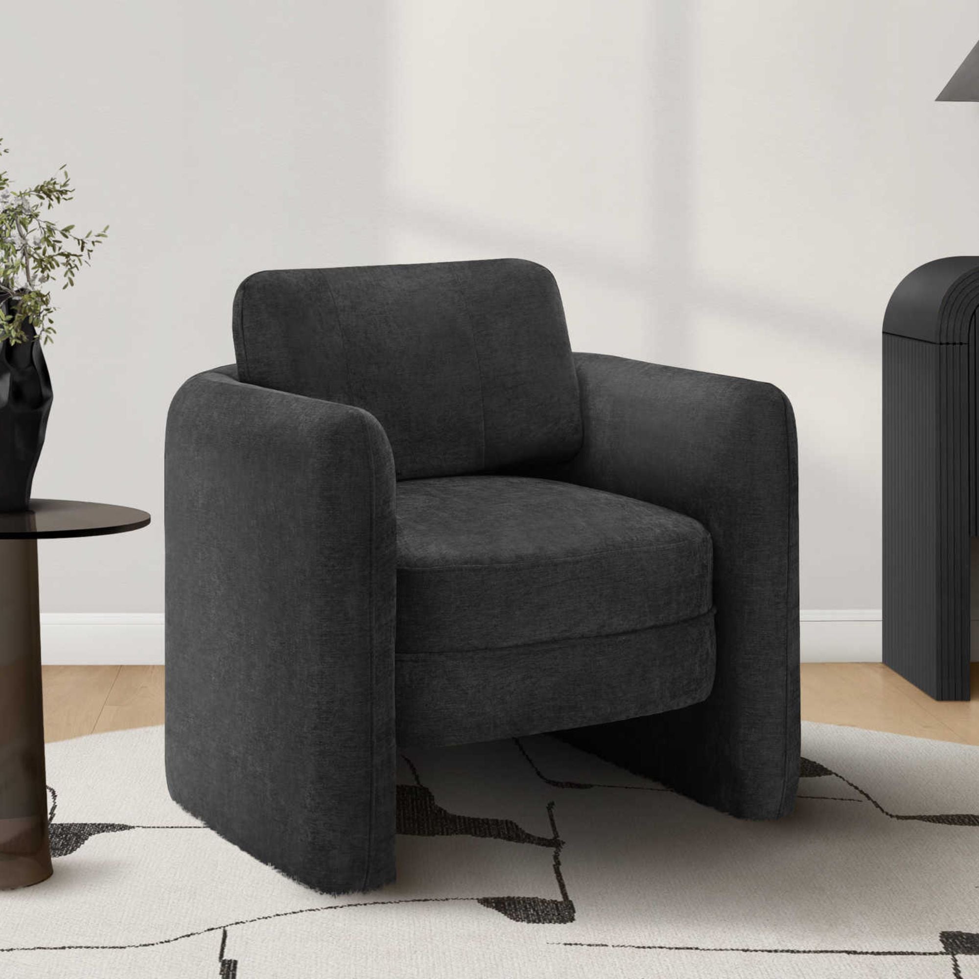 Black fabric accent chair by Monarch Specialties featuring a modern design with a cushioned seat and sleek wooden legs.