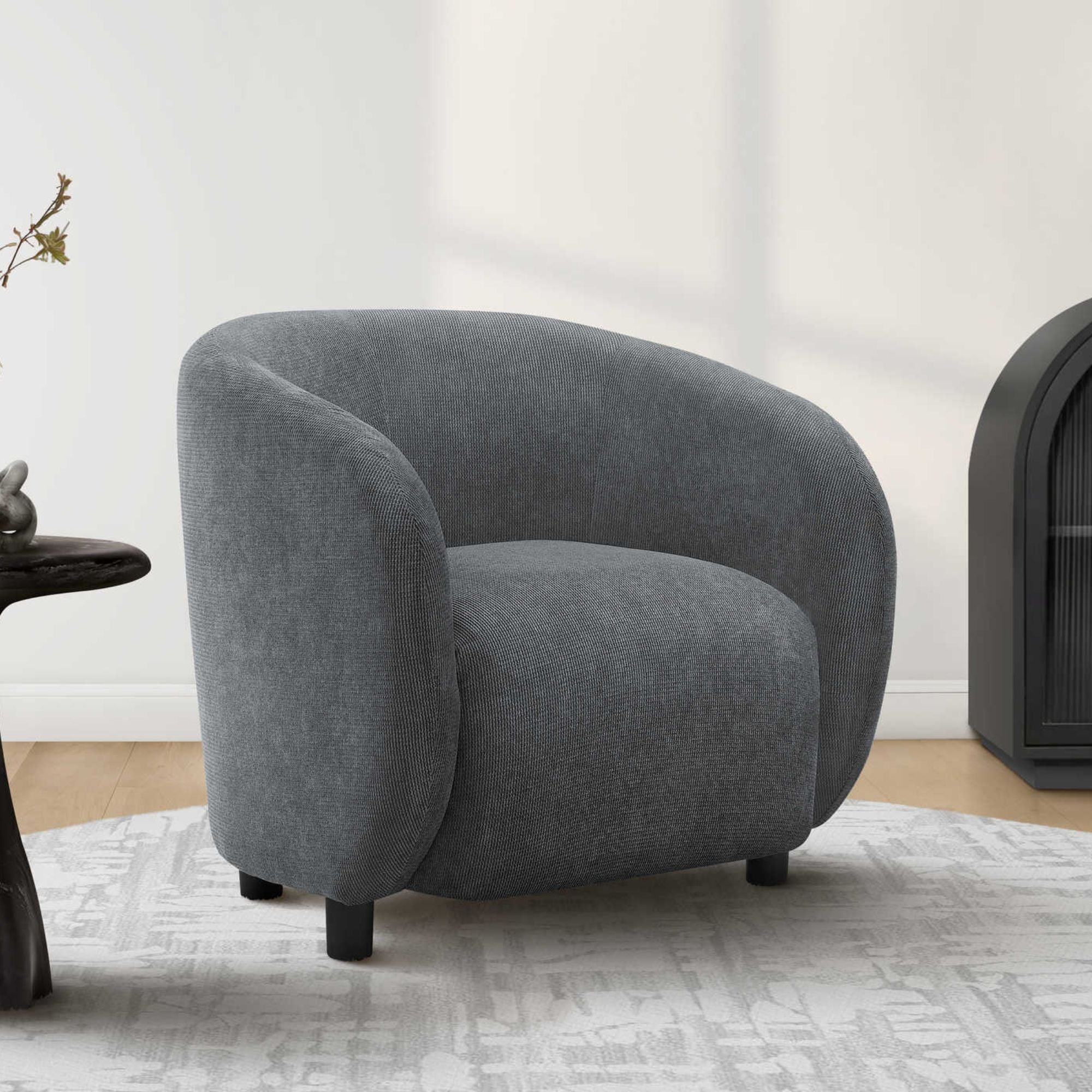 Dark grey fabric barrel accent chair with 30-inch height, featuring a modern design by Monarch Specialties.