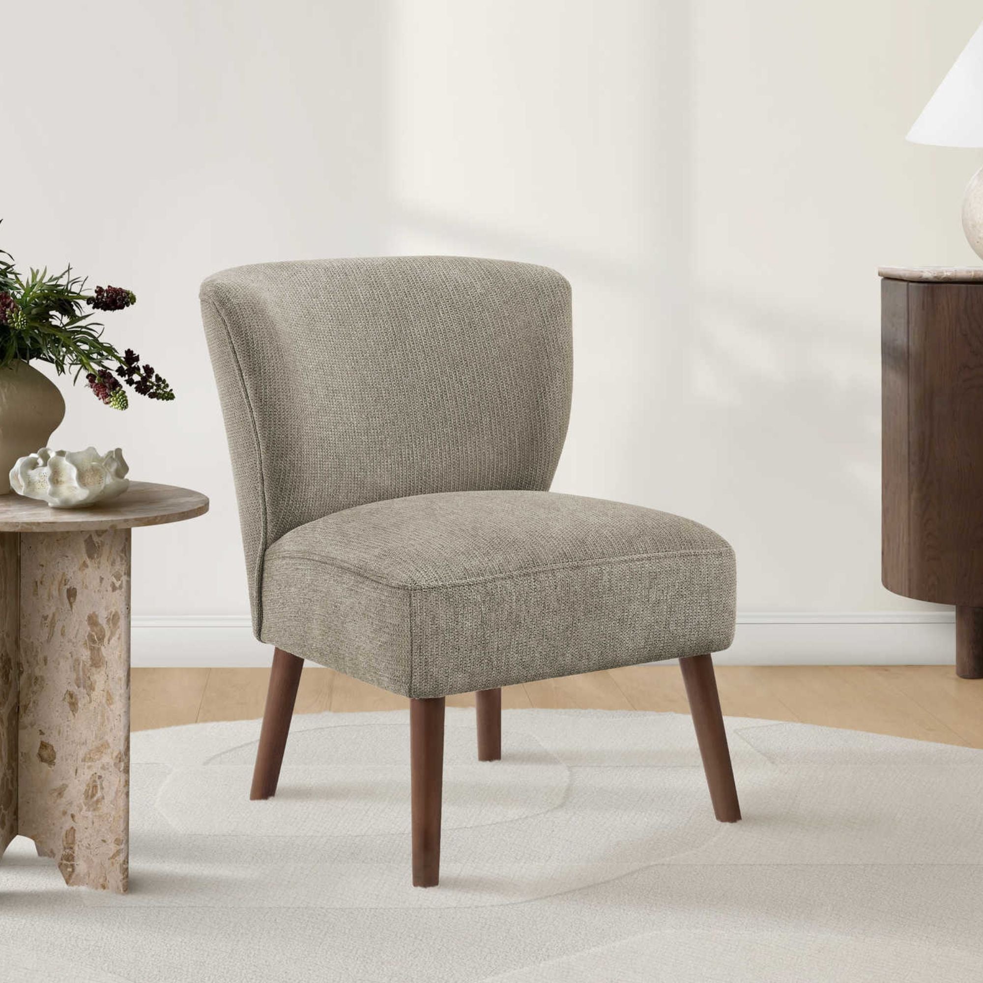Light brown fabric accent chair by Monarch Specialties with a modern design and comfortable cushioning.