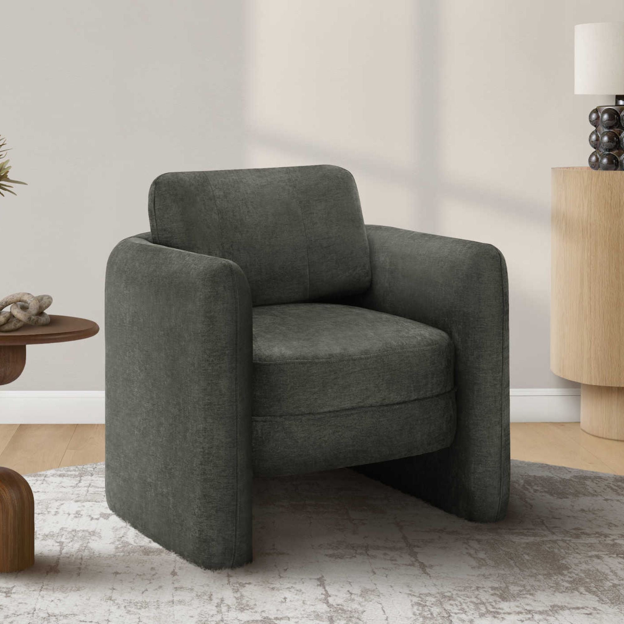 Dark grey fabric Monarch Specialties accent chair with modern design and cushioned seat, ideal for living rooms or bedrooms.