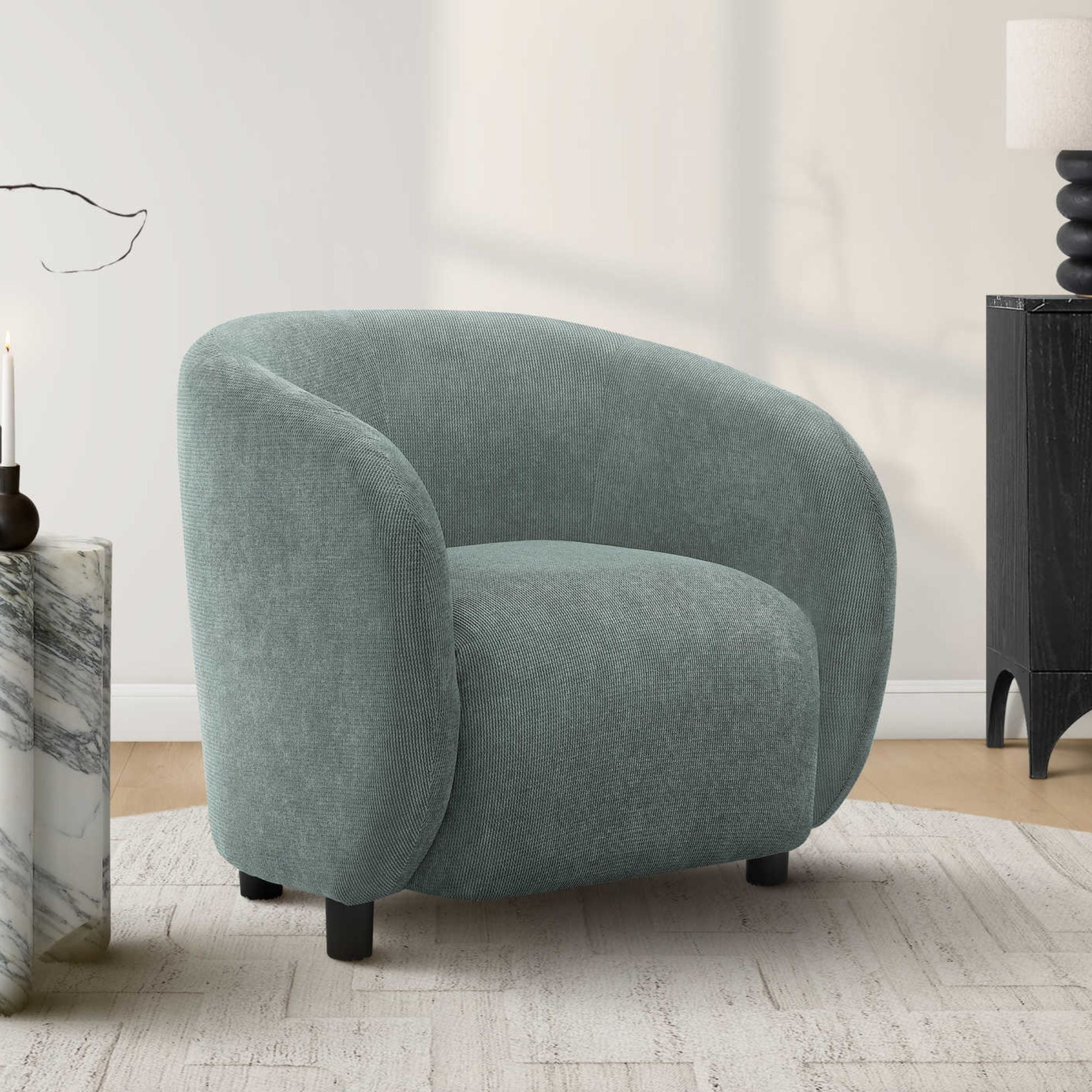 Green fabric barrel accent chair from Monarch Specialties, 30-inch tall with rounded arms and cushioned seat.