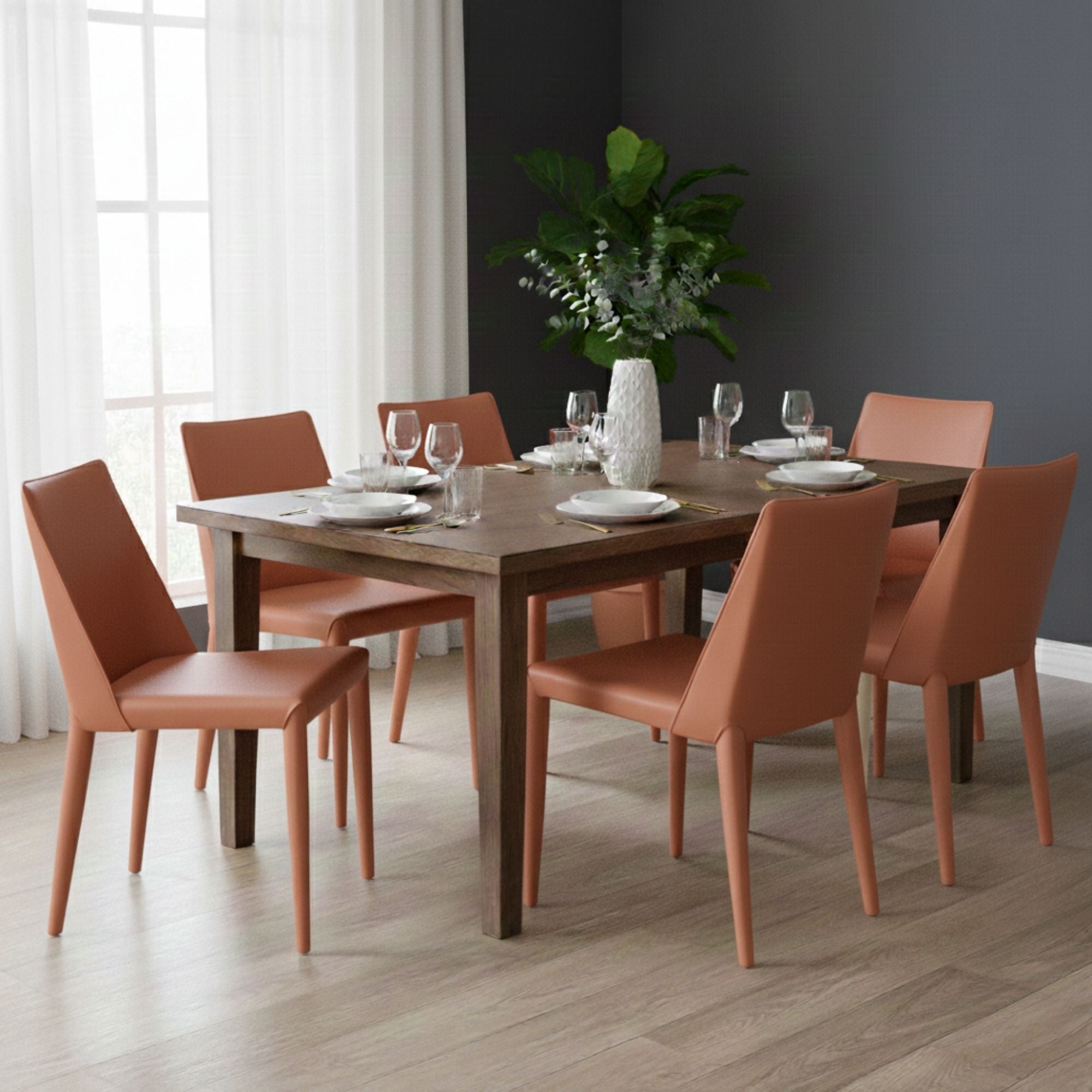 Set of orange Ace dining chairs by Elite Living, featuring modern terracotta-colored upholstered seats and sleek wooden legs.