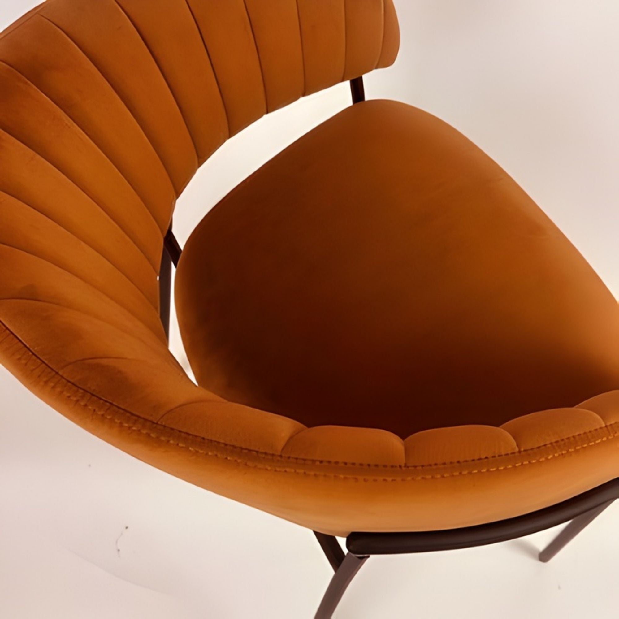 Set of two orange Amanda dining chairs by Elite Living with sleek wooden legs and modern design.