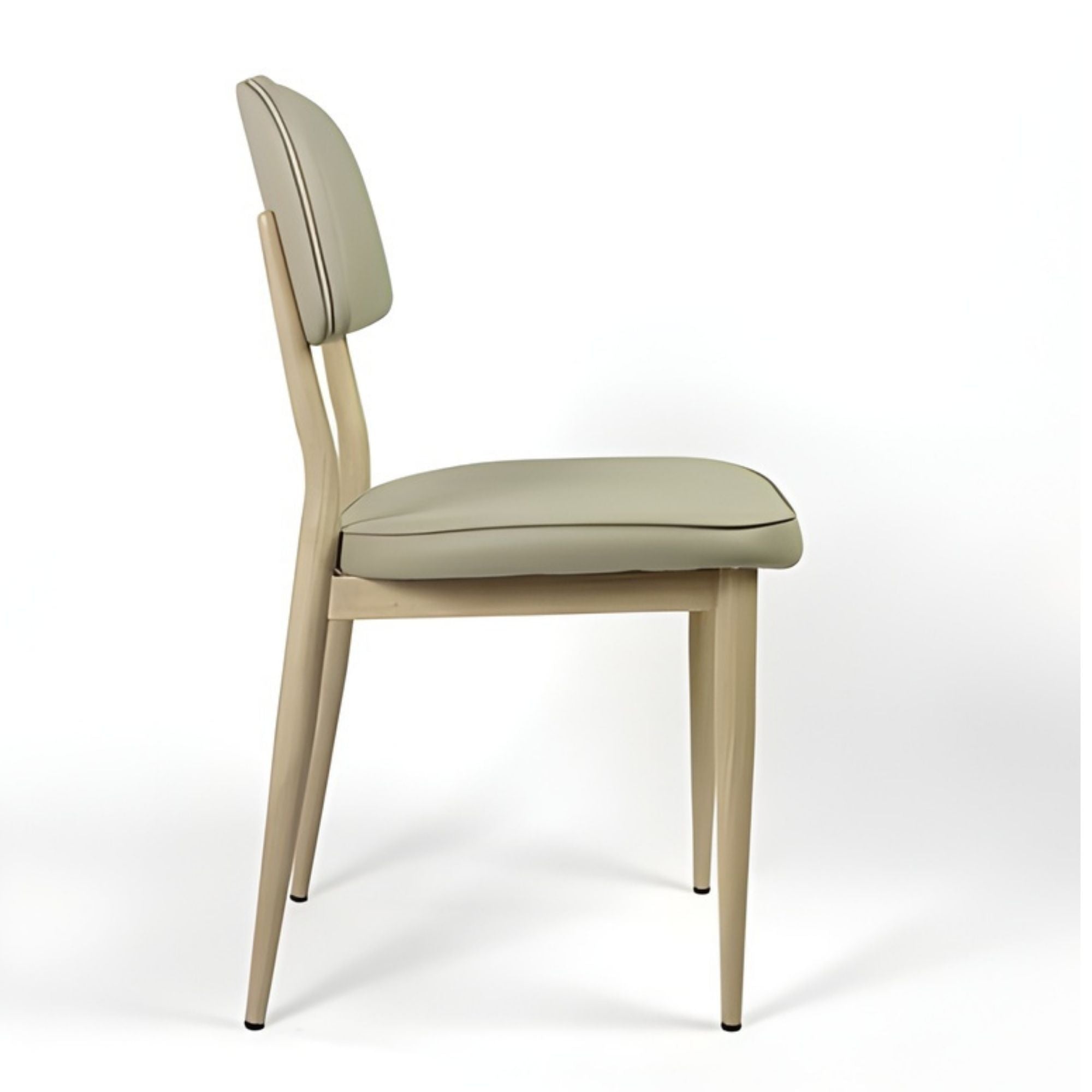 Beige Anton dining chair by Elite Living with wooden legs and upholstered cushioned seat, modern and stylish for dining room.