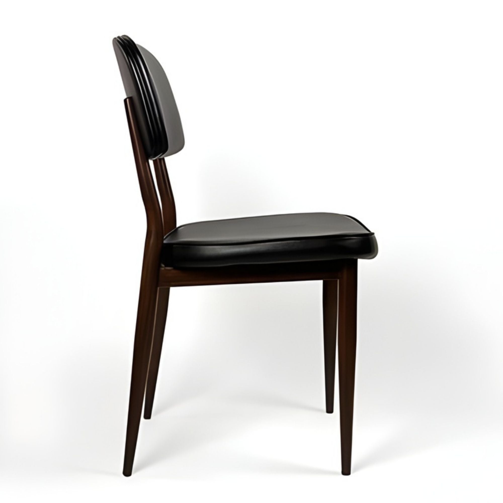 Black Anton dining chair by Elite Living featuring a sleek, modern design with wooden legs and a comfortable upholstered seat.
