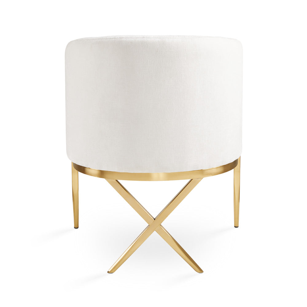 Xcella Anton brushed gold accent chair with ivory upholstery, showcasing a stylish back view in a modern living space.