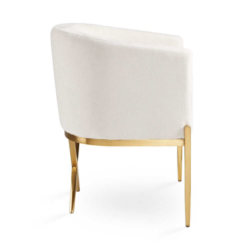 Xcella Anton brushed gold accent chair with ivory upholstery, shown from side view, stylish and modern seating for living spaces.