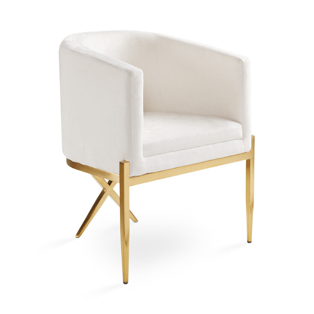 Xcella Anton brushed gold accent chair with ivory upholstery, featuring a stylish three-quarter view in a modern living space.