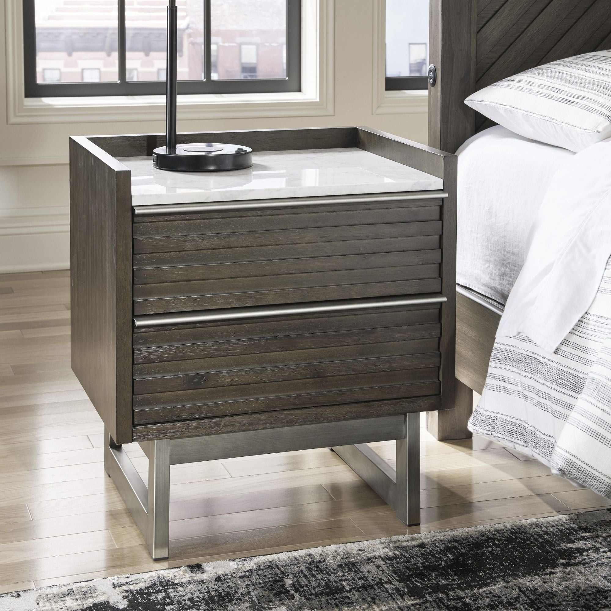 Grayish brown and white Arkenton marble top two-drawer nightstand by Signature Ashley with sleek design and storage drawers.