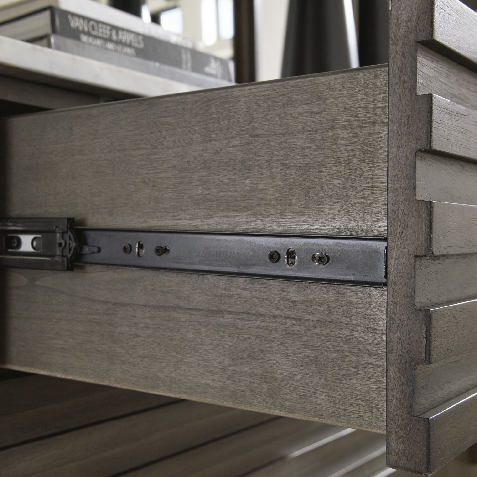 Grayish brown and white marble top nightstand with two drawers from Ashley's Arkenton bedroom collection.