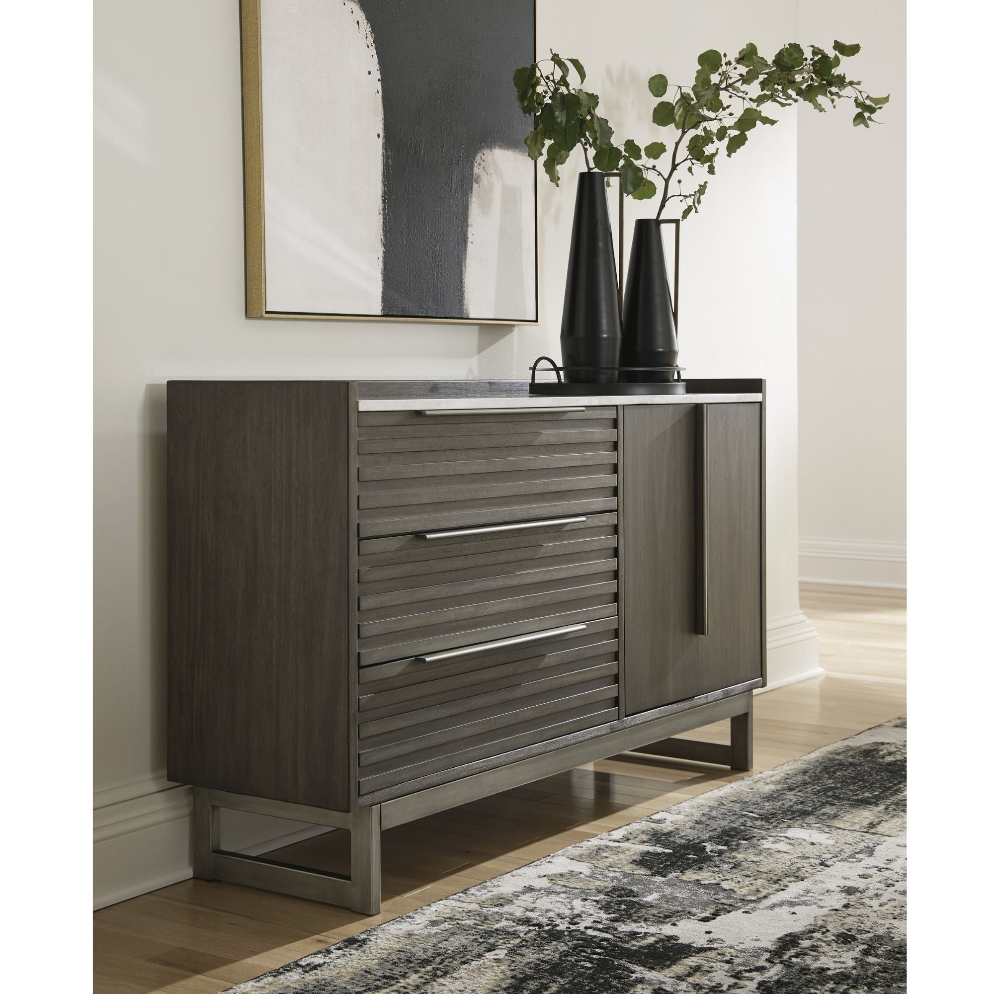 Arkenton white marble top dresser by Signature Ashley featuring a grayish brown and white finish, with multiple drawers and sleek design.