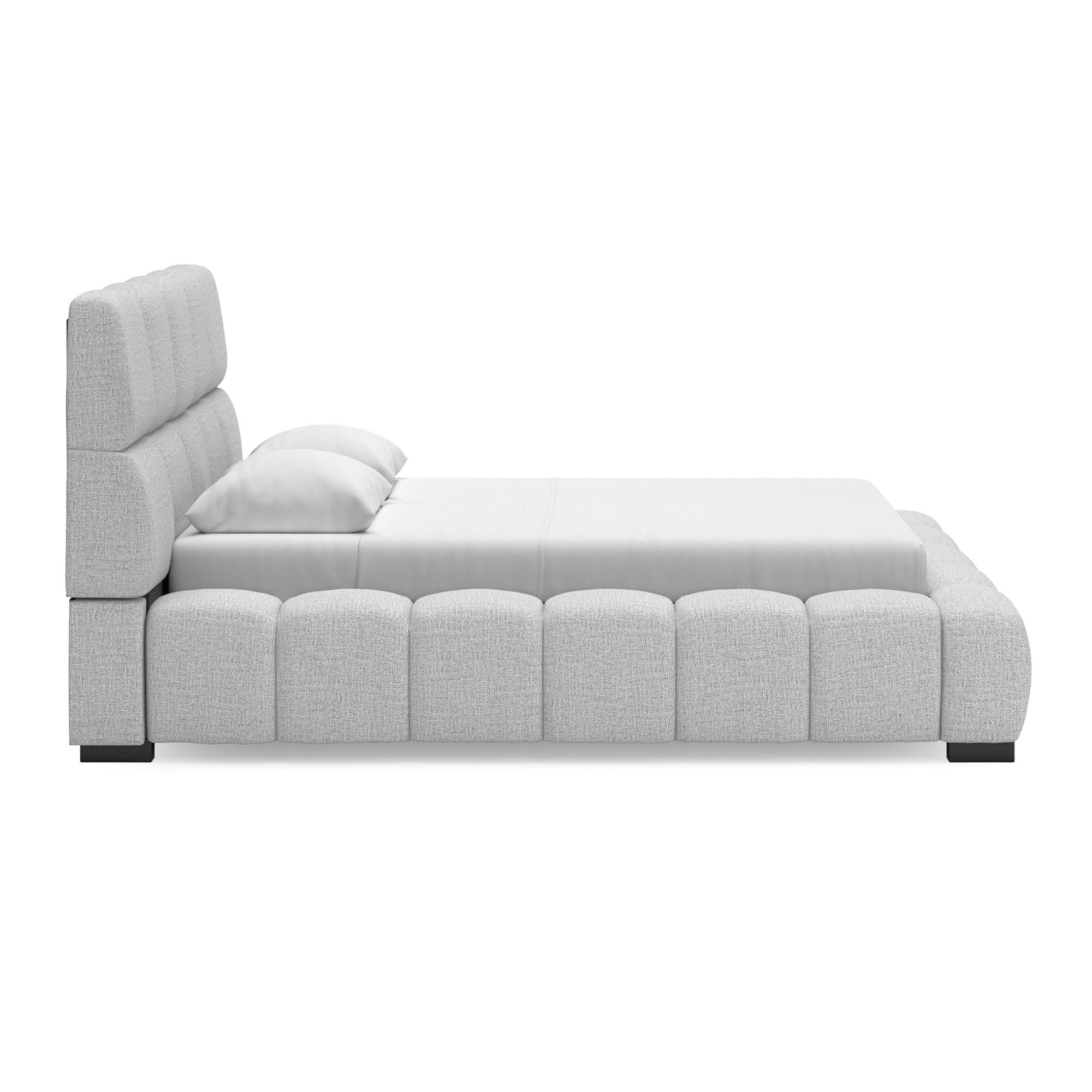 Light gray upholstered Ashley bed with plush headboard and modern design, perfect for stylish bedrooms.