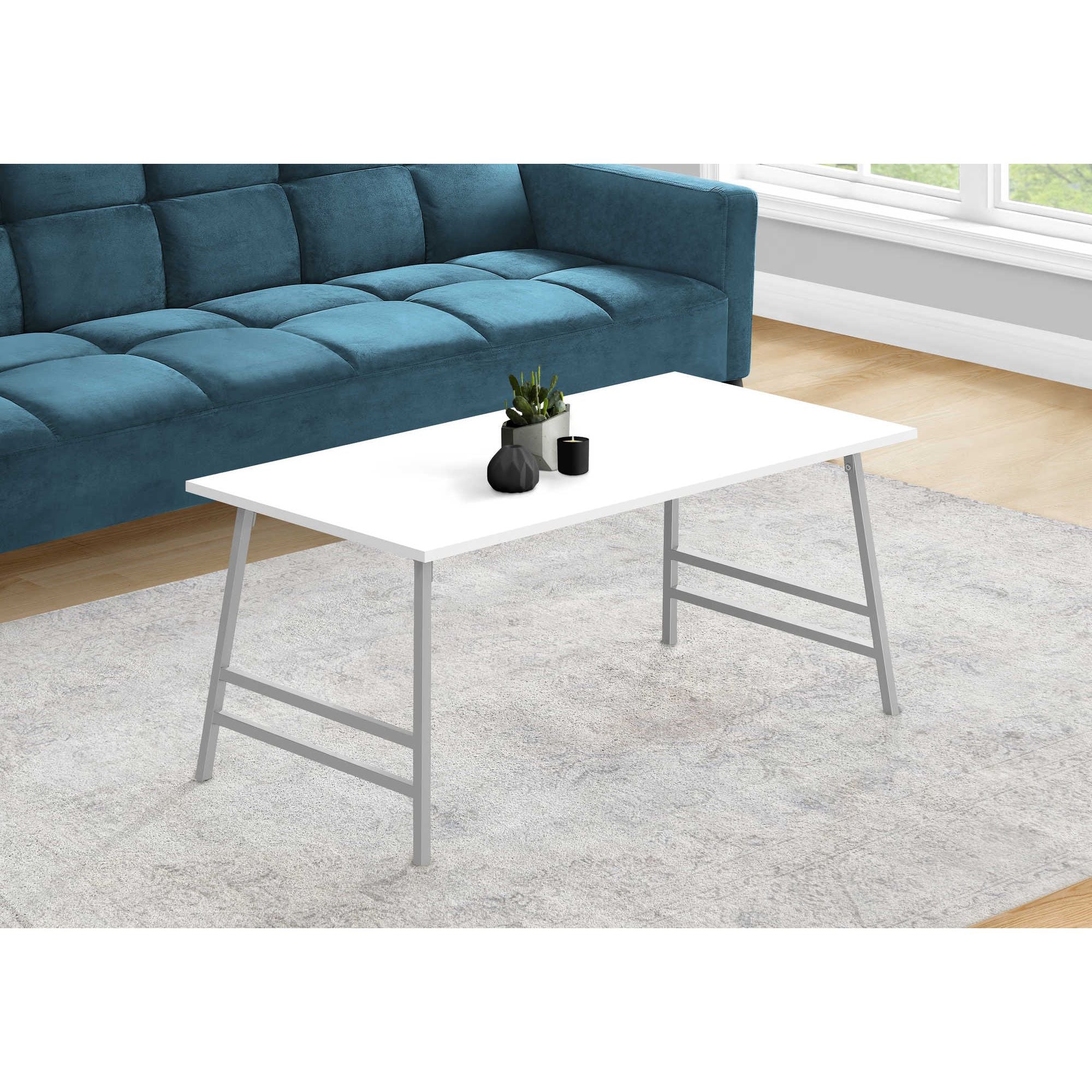 White Cavaro coffee table by Monarch Specialties with sleek design, showcases smooth surface and modern style.