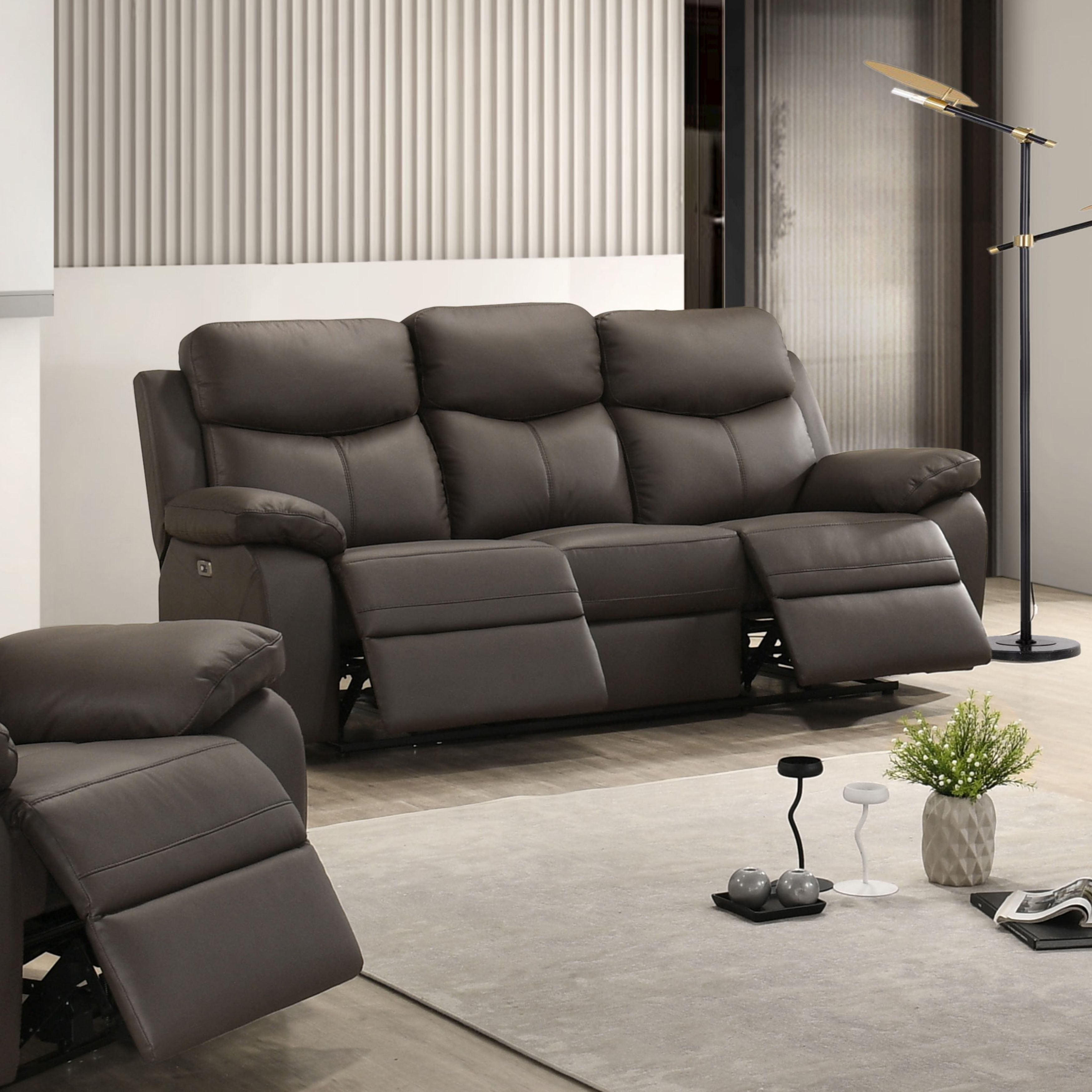 Chocolate Axton Luxe leather power recliner sofa by IFF featuring plush cushions and modern reclining design.