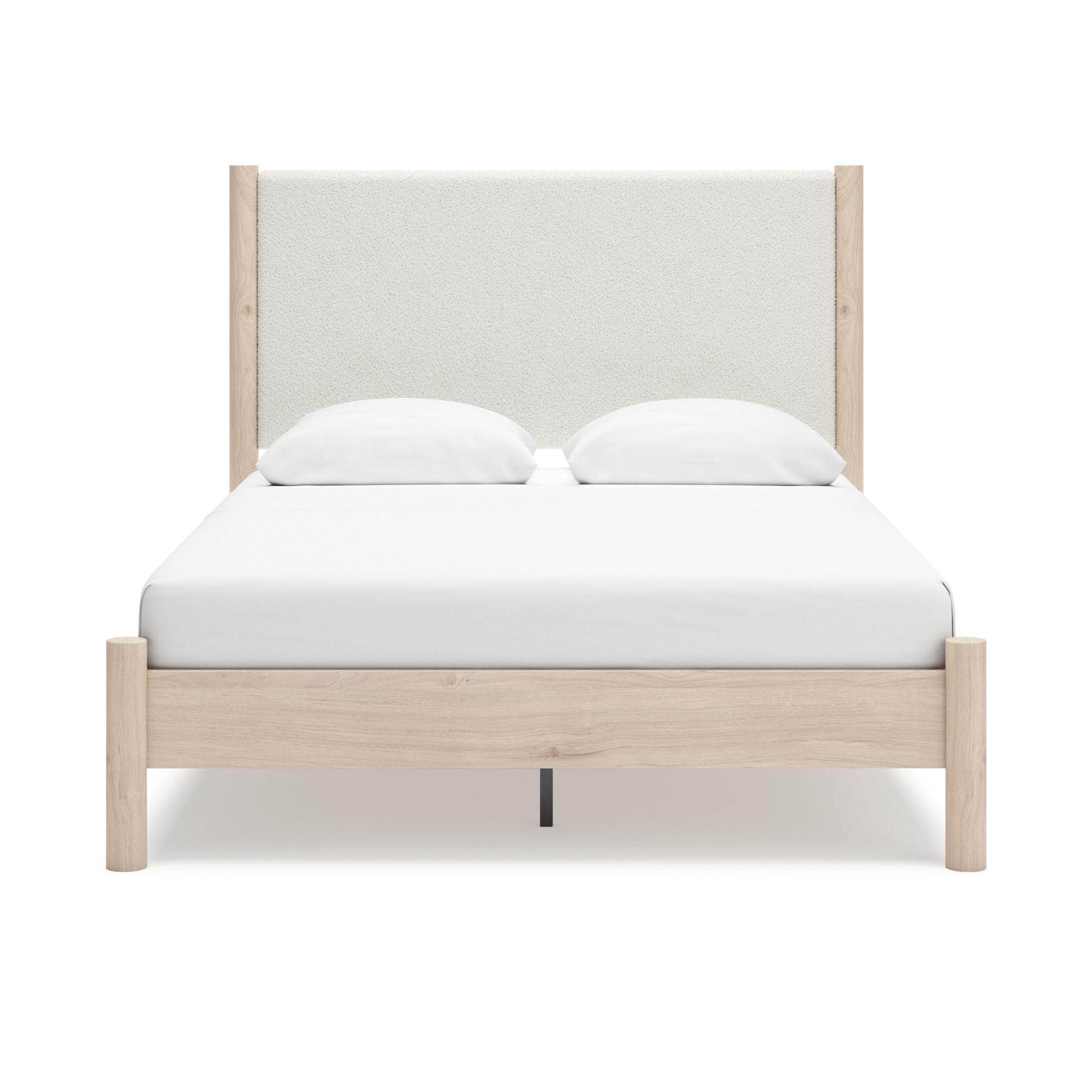 Ashley Cadmori upholstered panel bedroom set in natural finish, featuring a bed with padded headboard and matching bedroom furniture.