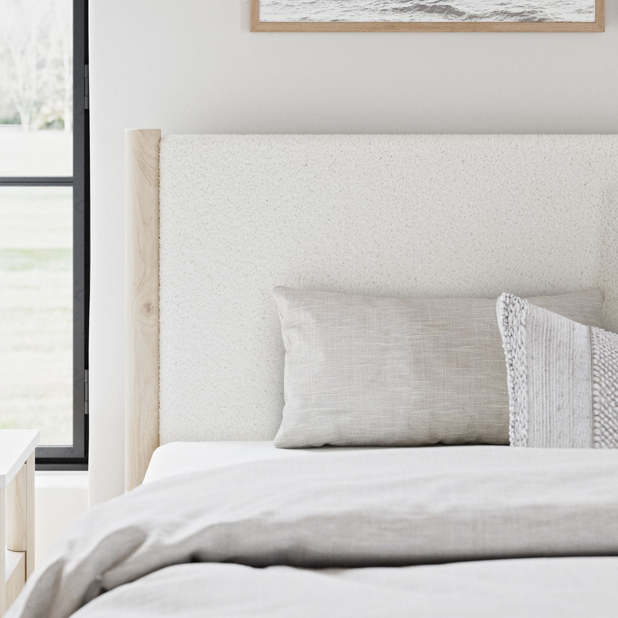 Natural upholstered panel platform bed by Signature Ashley with a modern design, featuring a padded headboard and neutral fabric upholstery.