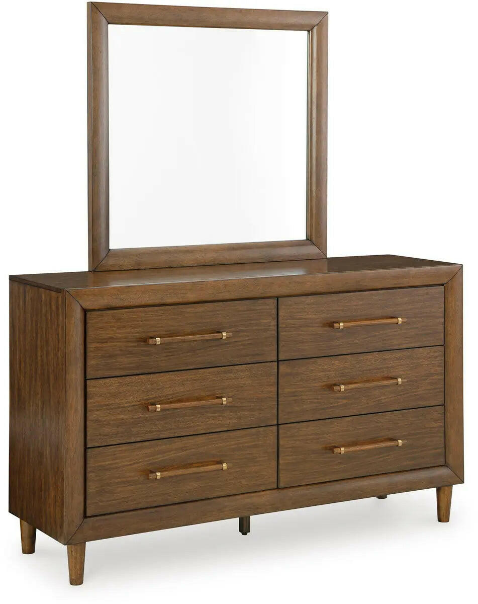 Signature Design by Ashley Lyncott upholstered panel bedroom set with bed, matching nightstands, and storage drawers.