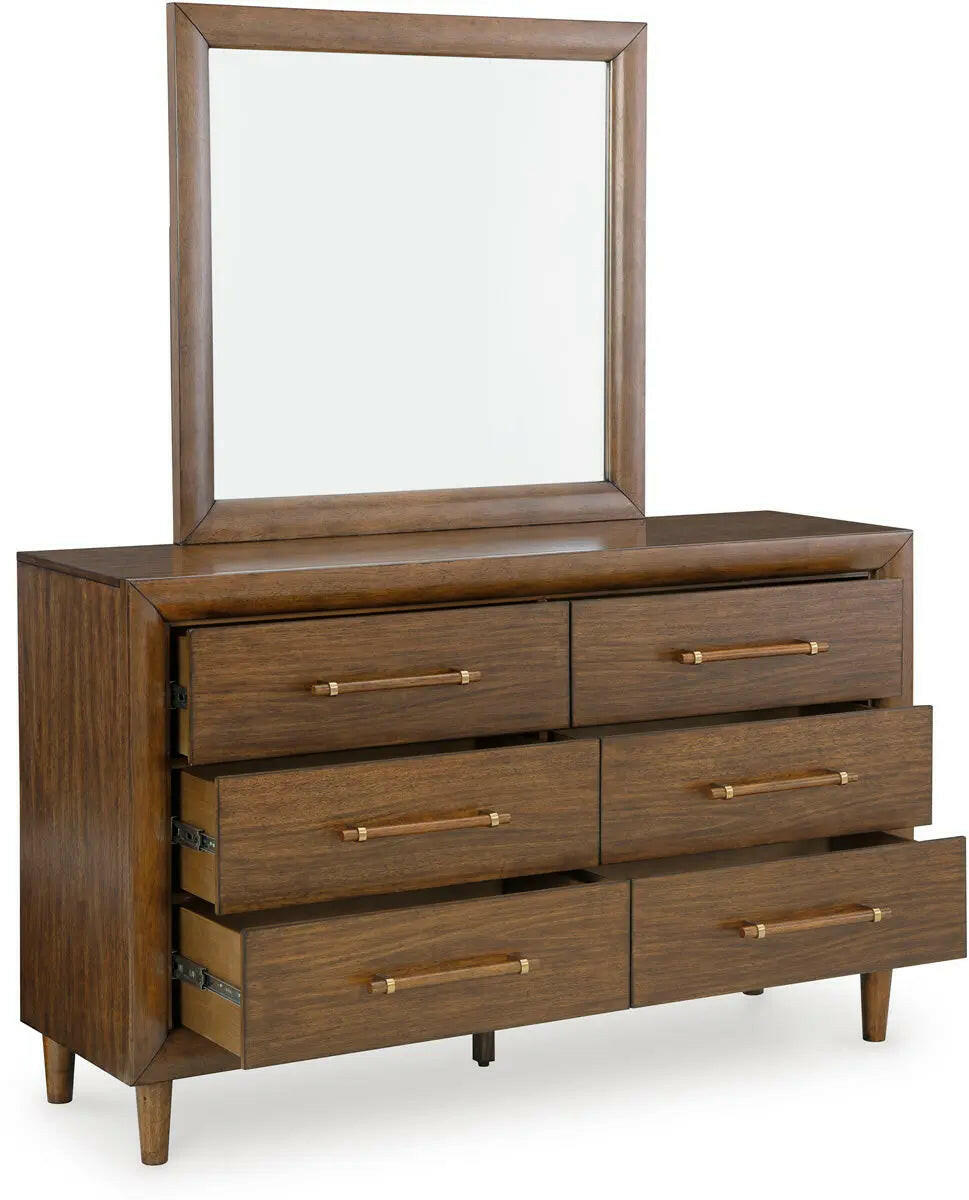 Signature Design by Ashley Lyncott upholstered panel bedroom set shown from an angled open view, featuring a bed with upholstered headboard.