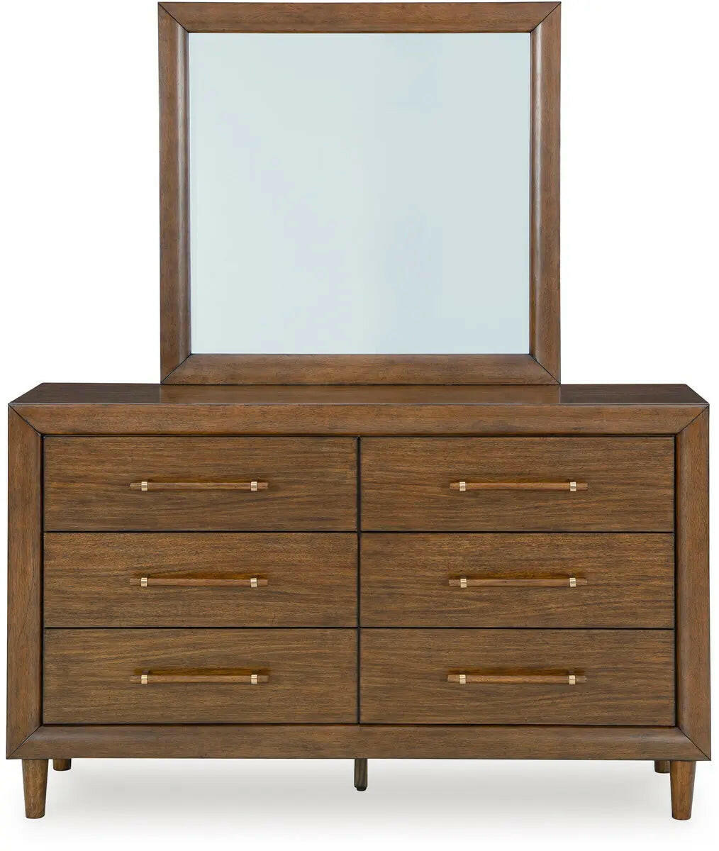 Signature Design by Ashley Lyncott upholstered panel bedroom set with headboard and coordinating furniture, in a modern bedroom setting.