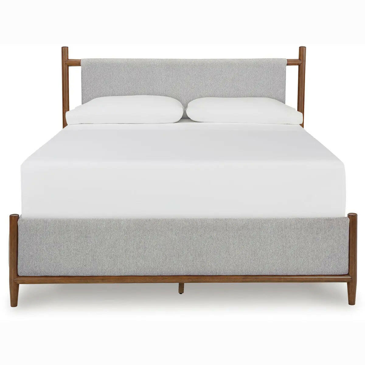 Signature Design by Ashley Lyncott upholstered panel bedroom set with headboard and matching furniture, in a cozy bedroom scene.