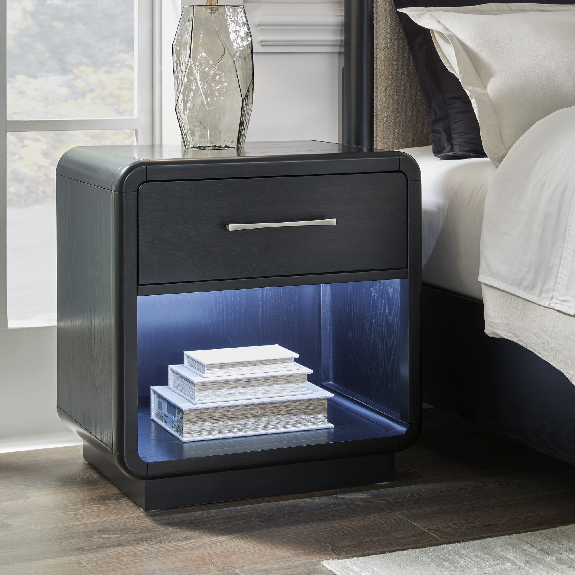 Signature Ashley Rowanbeck upholstered panel bedroom set with a bed, matching nightstands, and coordinated bedroom furniture.