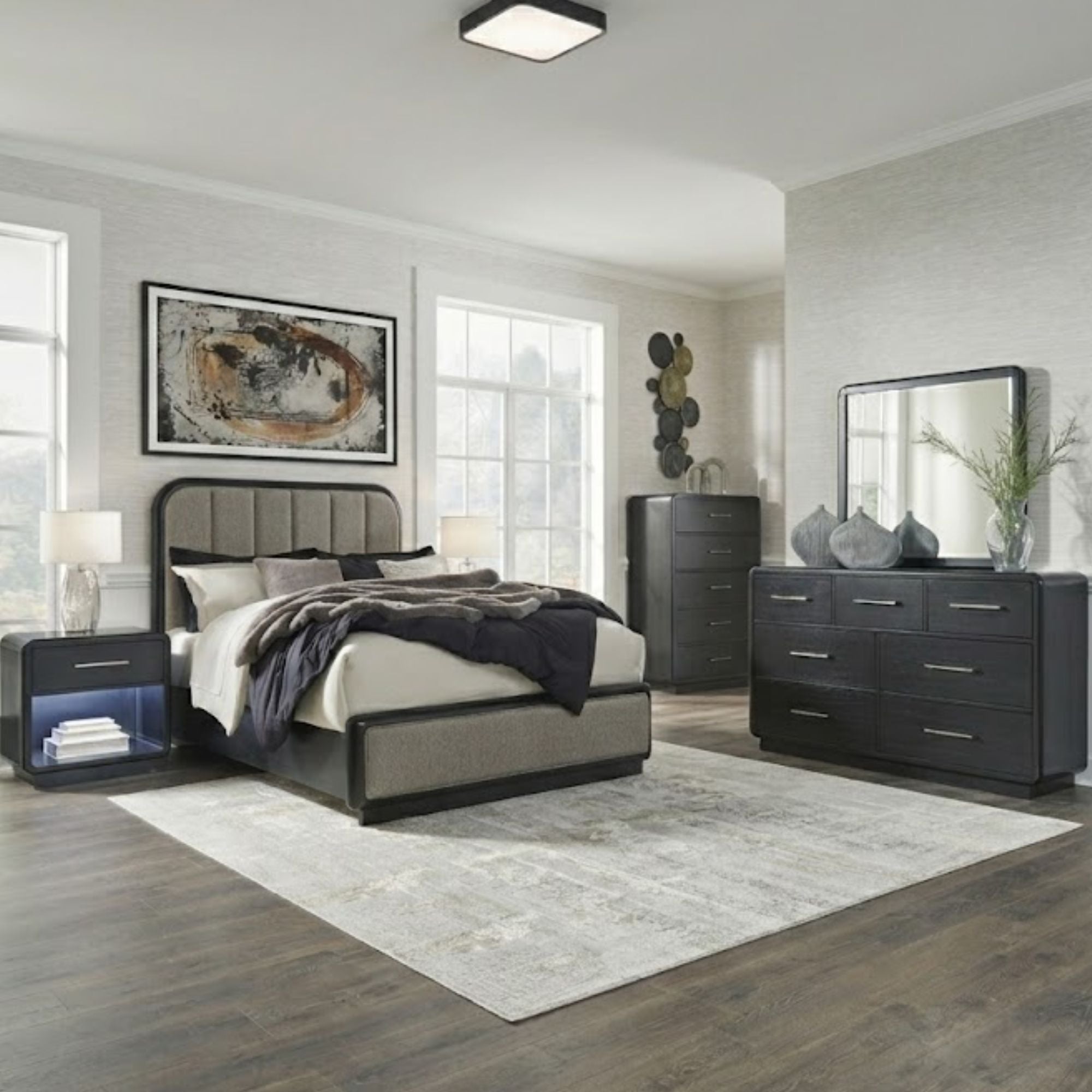 Signature Ashley Rowanbeck upholstered panel bedroom set with a stylish bed frame and matching bedroom furniture.
