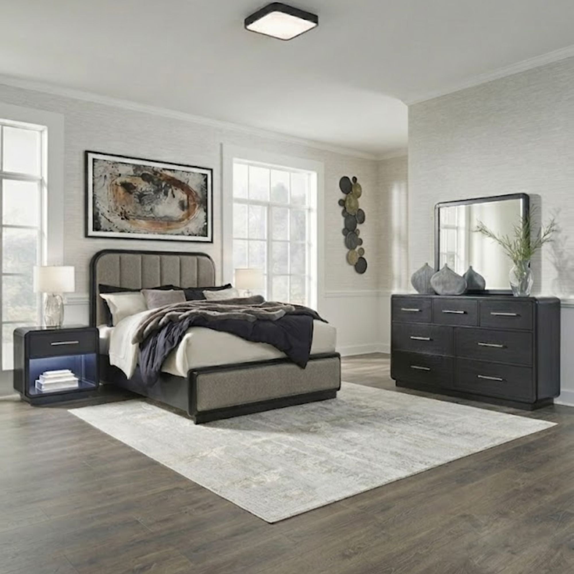 Signature Ashley Rowanbeck upholstered panel bedroom set with a bed frame, nightstands, and coordinated bedroom furniture.
