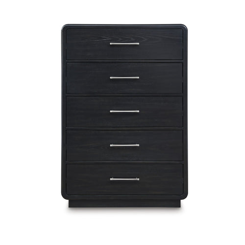 Signature Design by Ashley Rowanbeck upholstered panel bedroom set with a bed, nightstands, and matching furniture in a cozy bedroom.