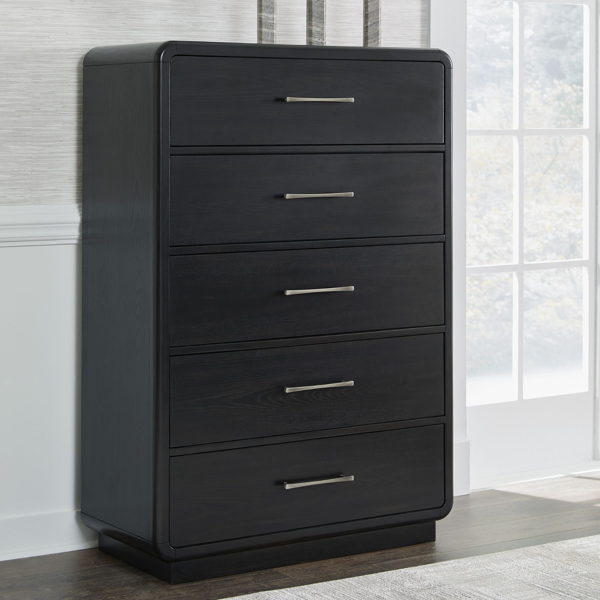 Signature Ashley Rowanbeck upholstered panel bedroom set with a bed, matching nightstands, and coordinated room decor.