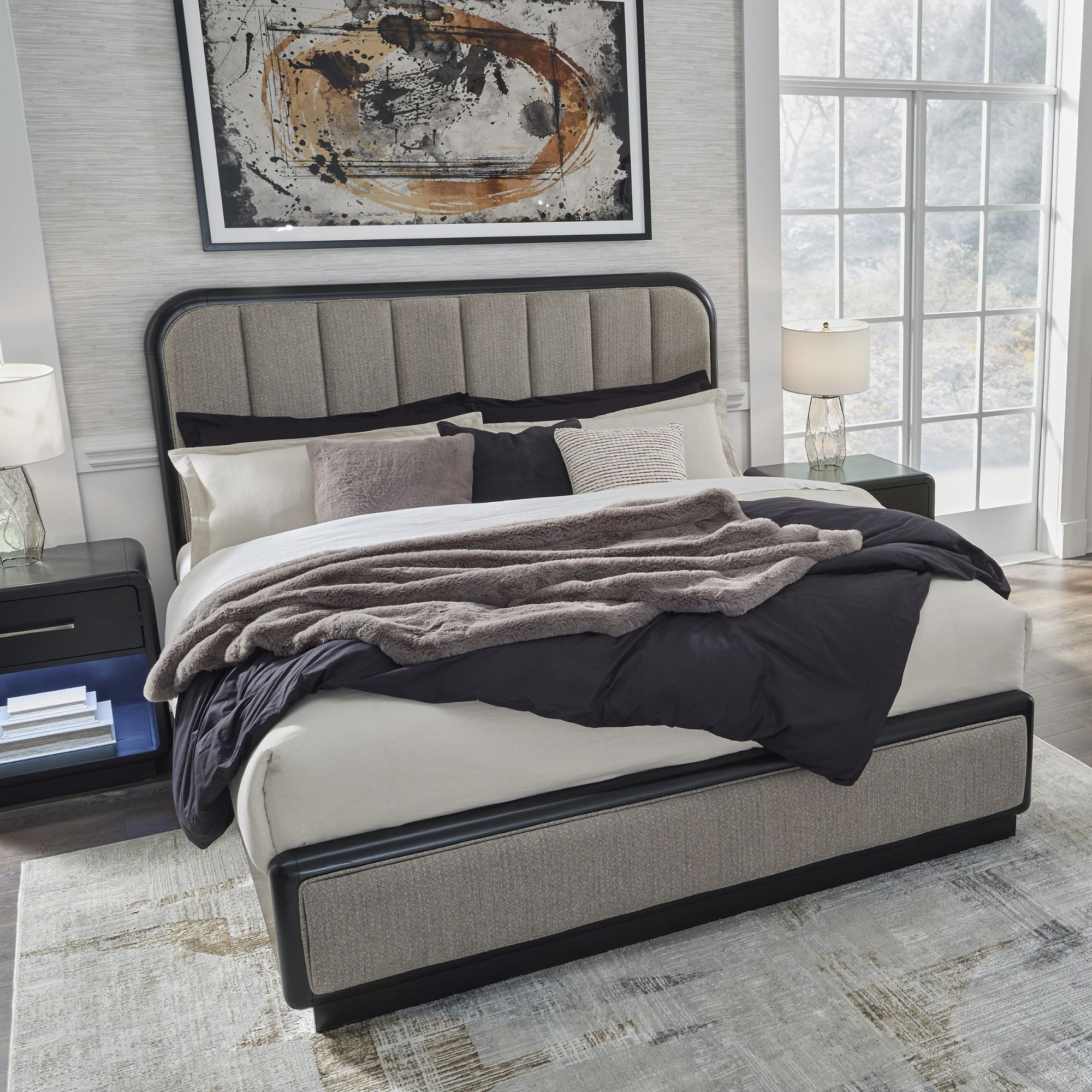 Signature Ashley Rowanbeck upholstered panel bedroom set with a bed, nightstands, and coordinating furniture in a modern design.