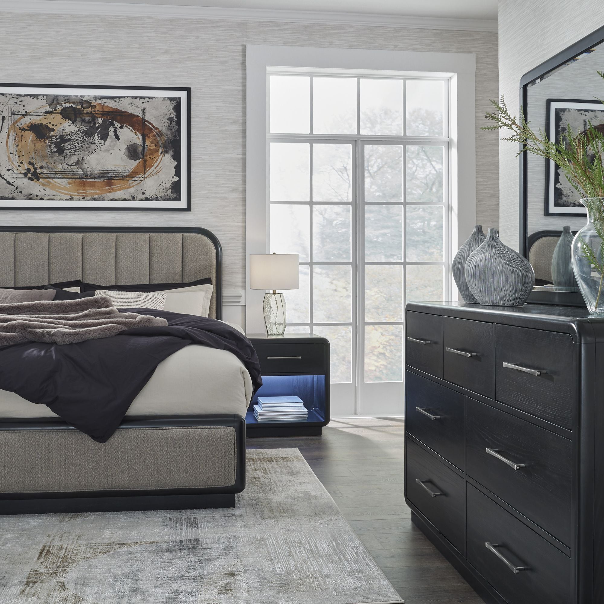 Signature Ashley Rowanbeck upholstered panel bedroom set with a modern bed frame and matching bedroom furniture shown in the image.